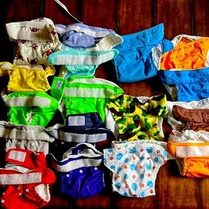 Lot of 17 pocket, one size cloth diapers. All need elastic replaced.
